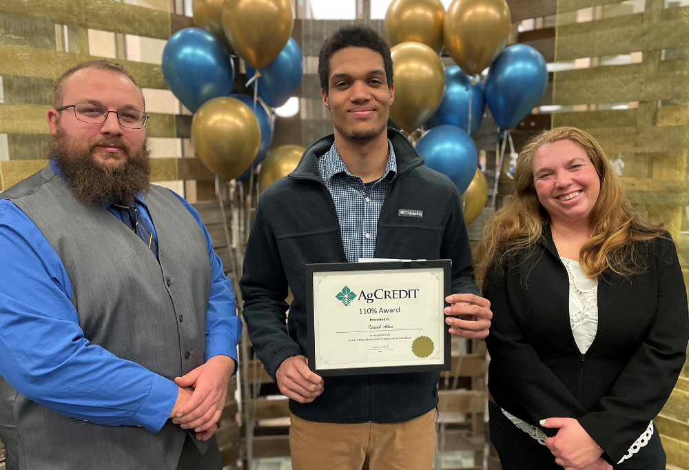 Mason Bremke, LCJVS Industrial Equipment Mechanics Instructor and FFA Advisor, Isaiah Allen, and Beth Berthold, LCJVS Landscape and Greenhouse Management Instructor and FFA Advisor. 