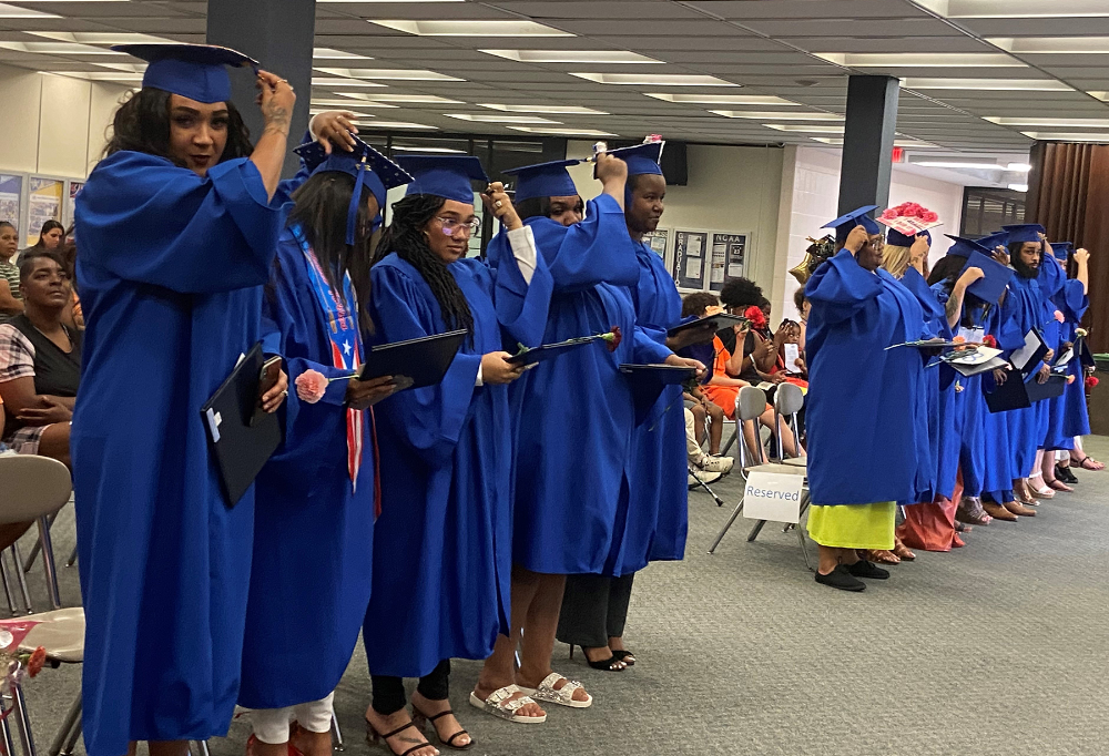 LCJVS ADP graduates move their tassles from the right side of their caps to the left.