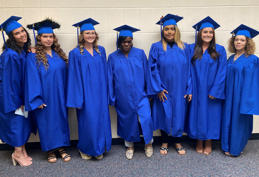 LCJVS Adult Career Center Adult Diploma Program grads in cap and gowns