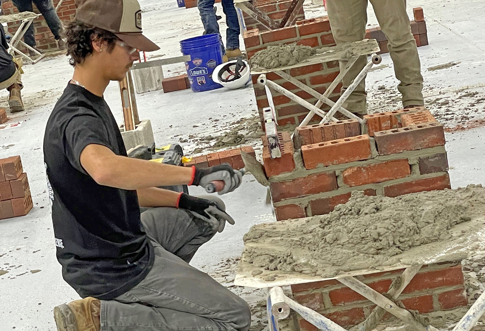 Elijah Gonzalez (Wellington) works on his brick structure at the Masonry Skills Competition 
