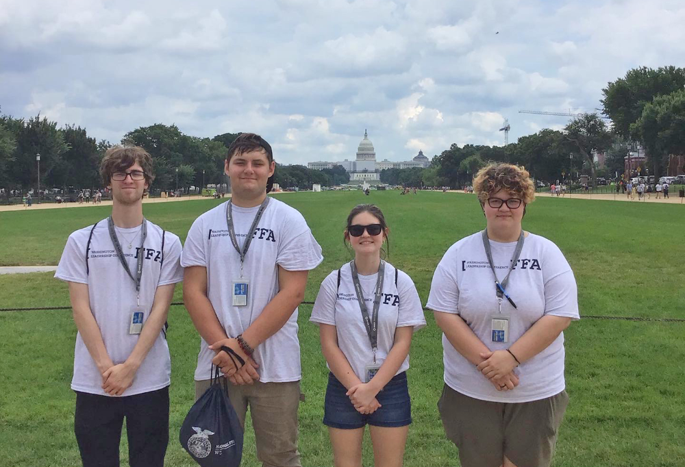 Kevin Daviduk (Amherst), Xander Blaylock (Midview), Kaylie Blank (North Ridgeville), and Haylei Ready (Elyria) on the National FFA Washington DC trip with the US Capitol in the background.
