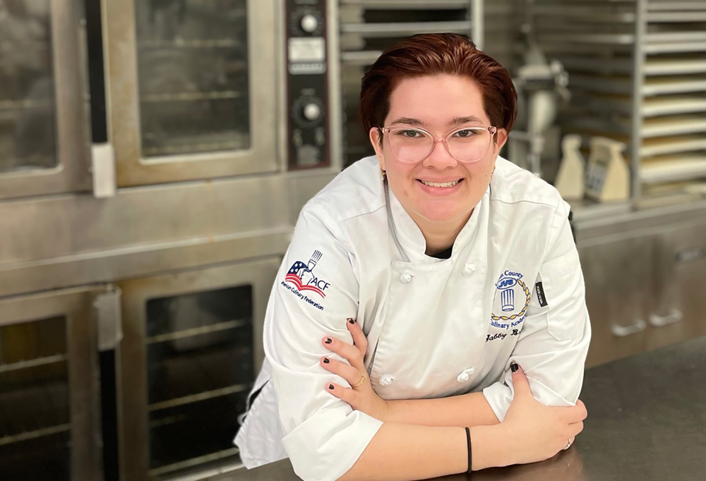 Gabrielle Brown (Clearview) bakery and pastry arts senior smiles in lab