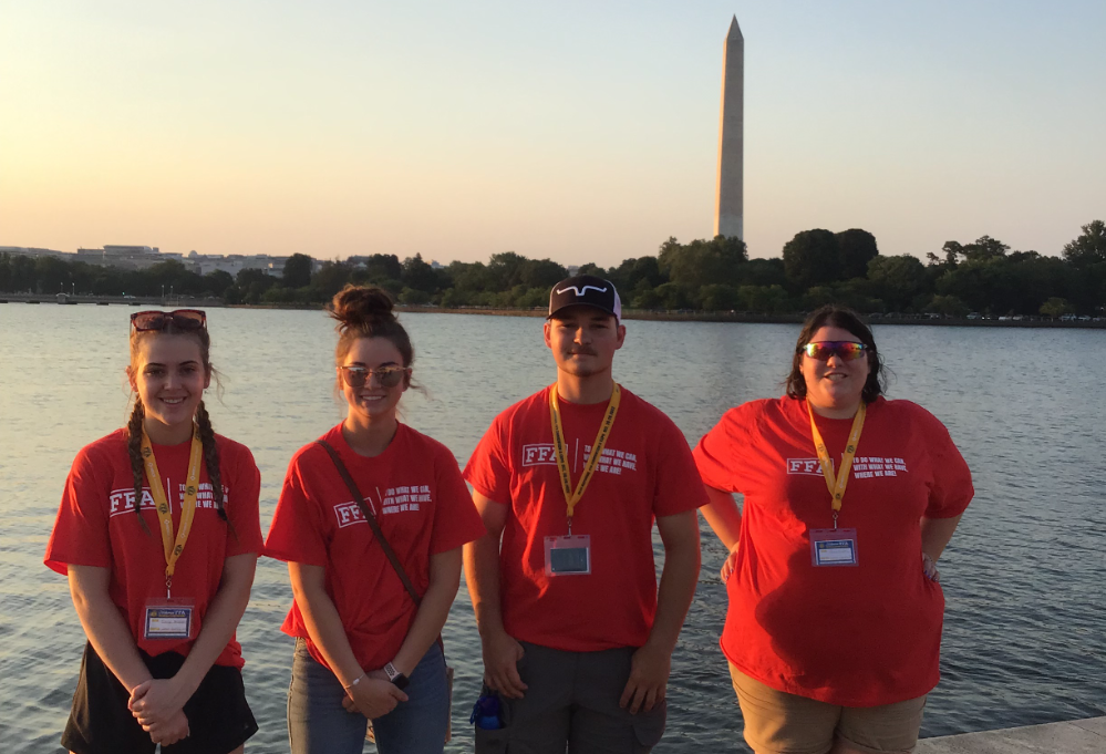 LCJVS FFA members stand in front of the Washington Monument during their Leadership Conference. From left: Emily McElheny (Amherst), Vayda Wiles (Firelands), Nate Sword (Wellington), and Allison Dubber (Keystone). 