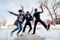 Students Jumping in the snow